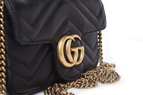 hoe herken je een echte michael kors tas
